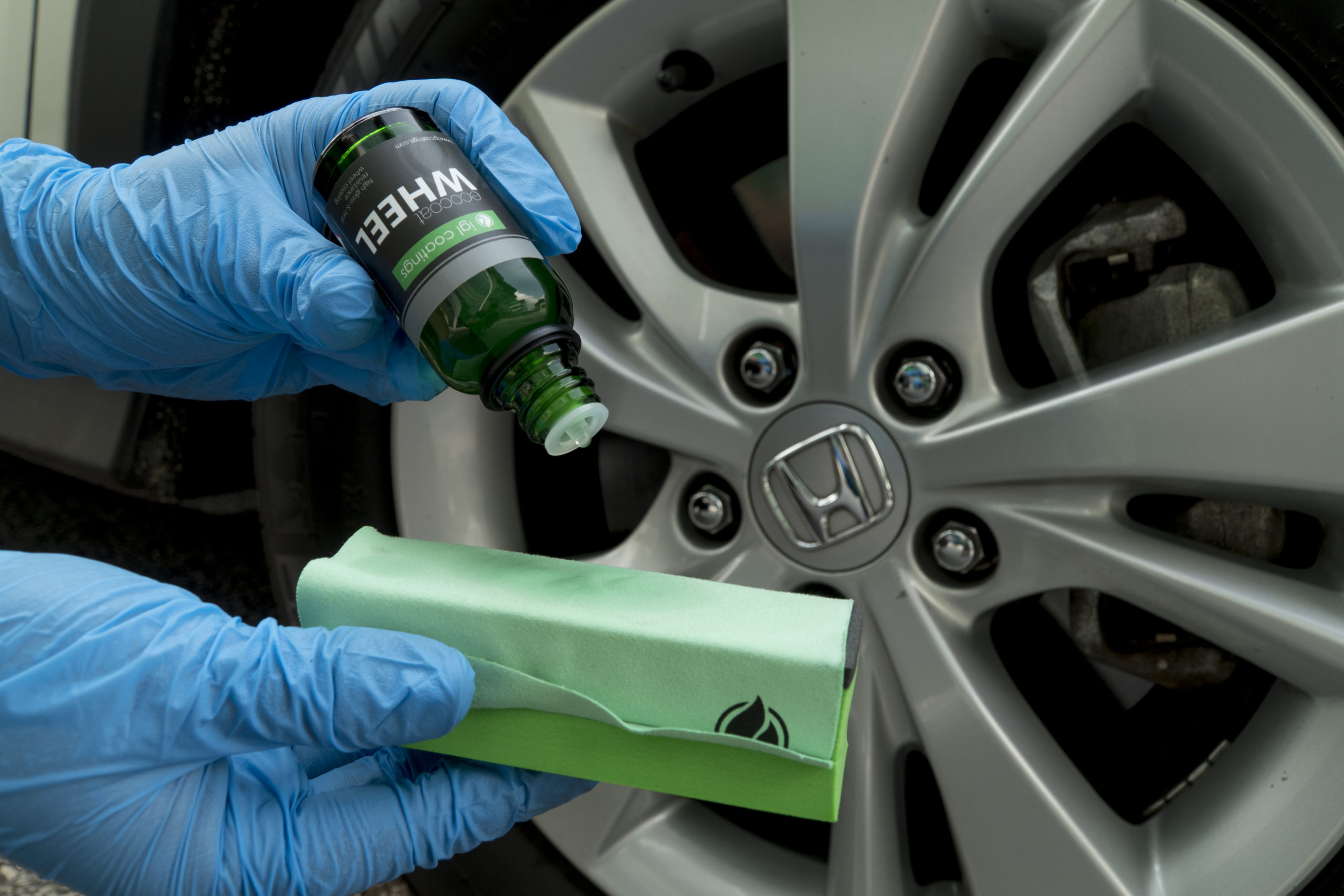 ecocoat wheel being prepared to be scrubbed on a wheel