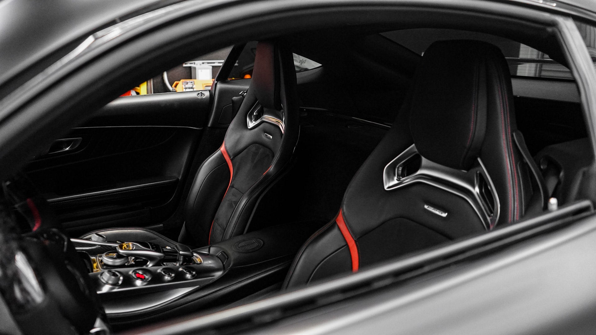 seats of a black and red mercedes